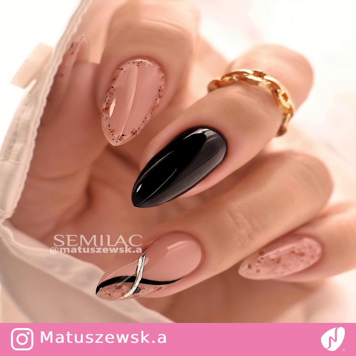 Mismatched Nude and Black Nail Art